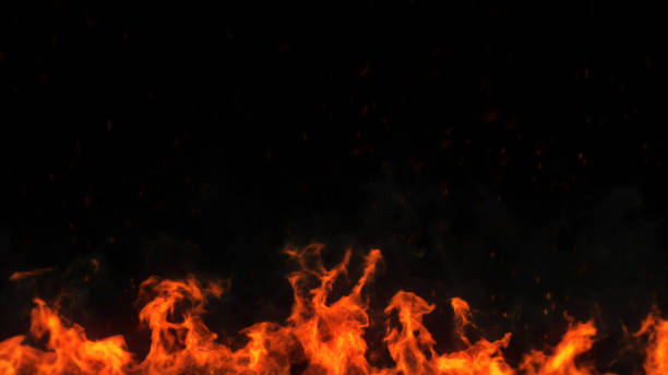 istock Red hot flames of fire isolated on black 1217087633