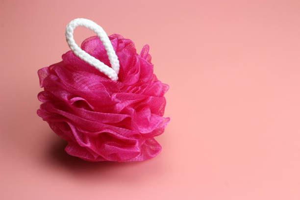 istock Red sponge, shot from the top on a pink background with a place for text 1217091223