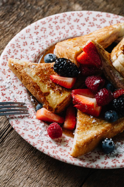 istock French toast served with syrup and fresh berries 1217091922
