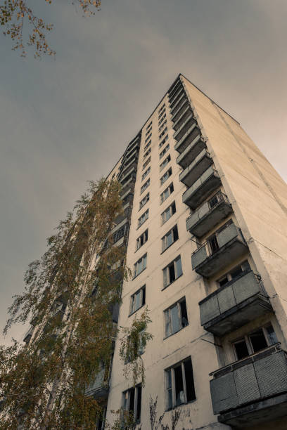 istock Looking up at an abandoned apartment skyscraper in Pripyat, Chernobyl Exclusion Zone 1217094842