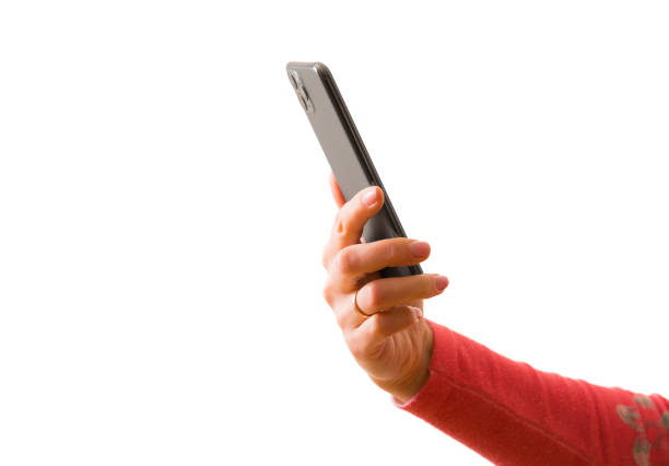 Person holding in hand mobile phone, photo isolated on white background