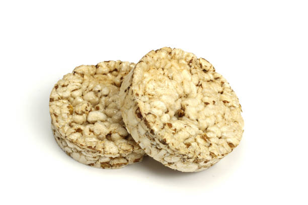 istock rice, buckwheat Crispbread isolated on white. Diet, proper nutrition, Vegan 1217095117