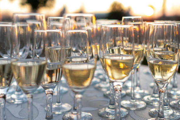 istock Many champagne glasses in sunset light 1217095156