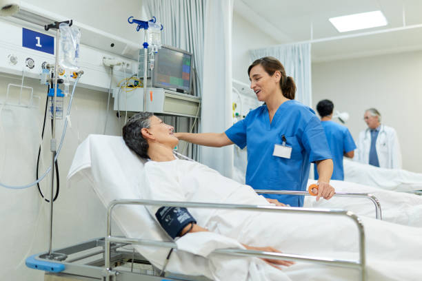 istock A nurse is comforting a patient before the surgical procedure. 1217096056