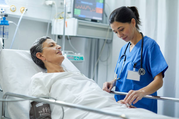 istock A female nurse is adjusting the finger pulse meter on a patient. 1217096082