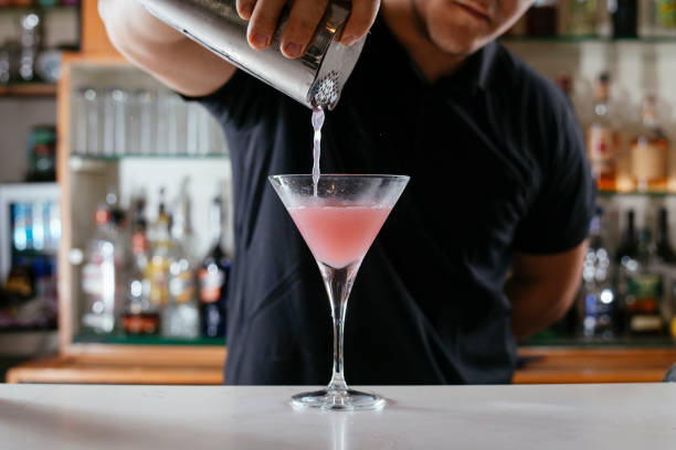 istock Barman making cocktails at bar 1217097199