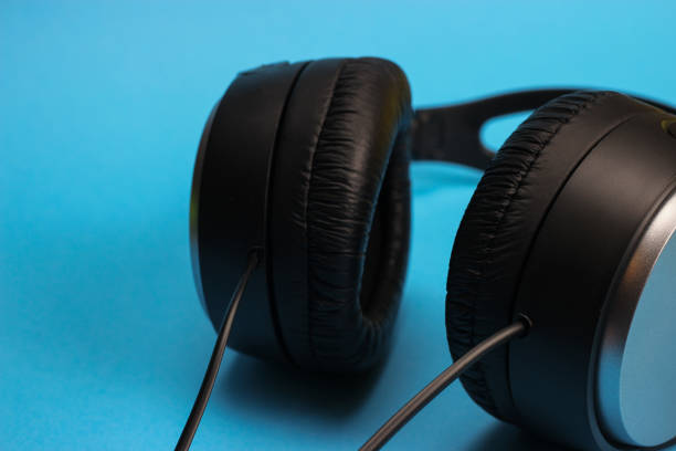 istock Full-Size Headphones on blue background. Close up 1217098188