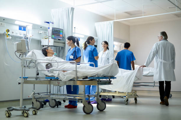 istock A doctor making rounds and visiting patients at the post operative area. 1217098770