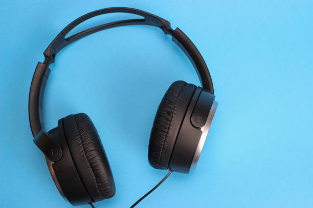 istock Full-Size Headphones on blue background 1217098780