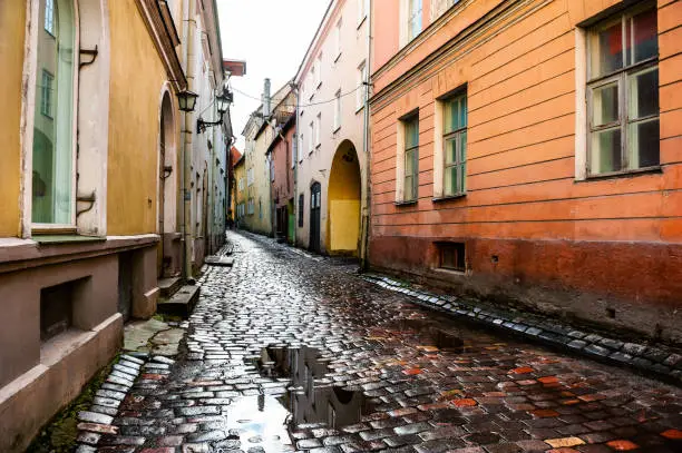 Streetview in Old Town of Tallinn, Estonia. Wet cobblestone after rain