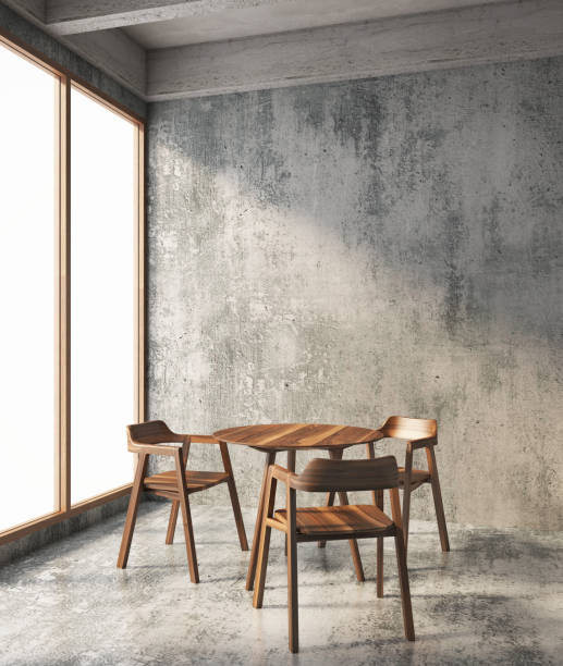 istock Loft interior of dining room with daylight from windows,rough concrete floor and wall. 3D illustration 1217100234