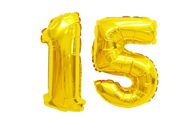 istock Golden Foil Balloon numbers in White Background 1217103163