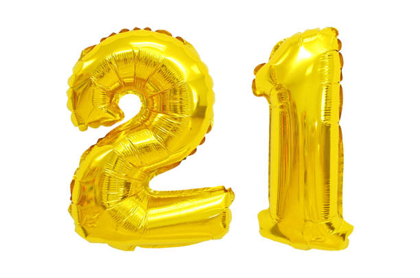 istock Golden Foil Balloon numbers in White Background 1217103207