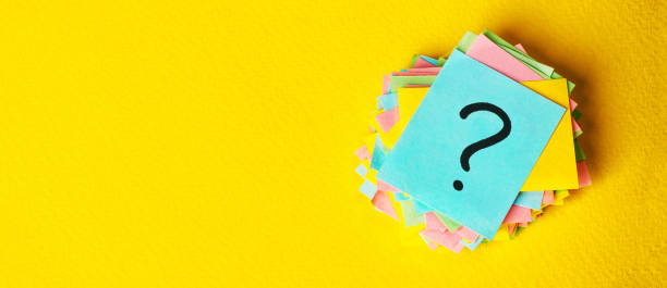 istock question marks written reminders tickets on yellow vintage paper background 1217103705