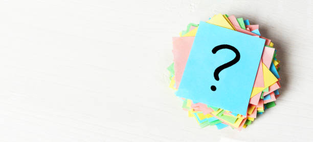 istock colorful question marks written reminders tickets. ask or business concept 1217104486