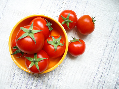 fresh tomatoes in the bowl