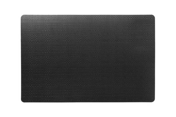 istock Top view of isolated black placemat for food. Empty space for your design 1217106938