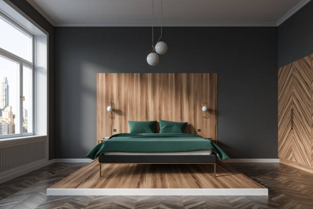 istock Gray and wooden master bedroom with wardrobe 1217108150