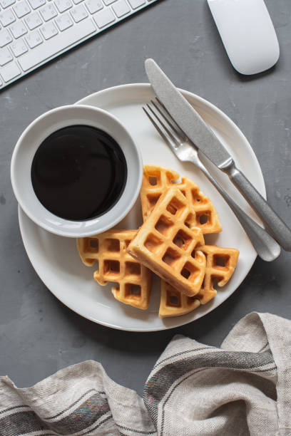 istock Belgian homemade biscuit waffles on a white plate 1217108175