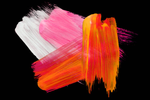 White pink and orange abstract paint brush strokes isolated over black