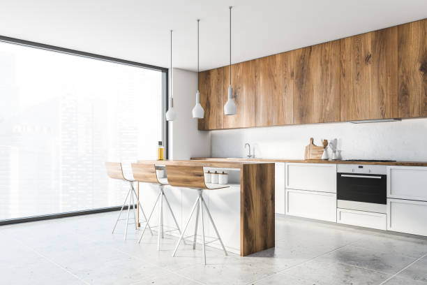 istock Panoramic white and wooden kitchen corner with bar 1217111166