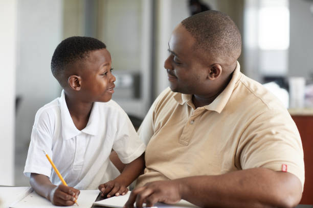 istock Portrait of Affectionate Bond Between African Father and Son 1217111663