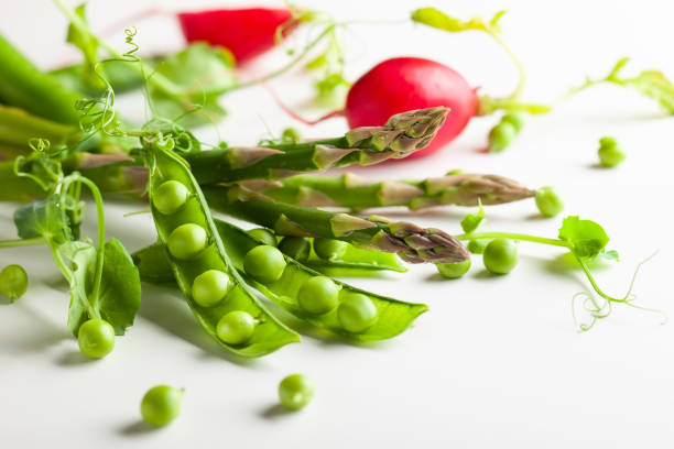 Fresh green  peas pods  with  sprouts, radish