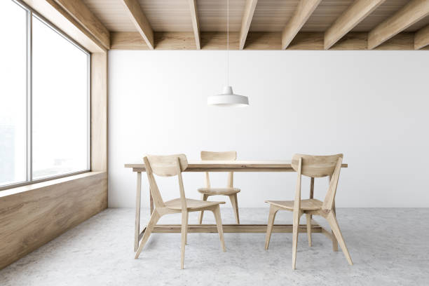 istock White and wooden dining room interior 1217112773