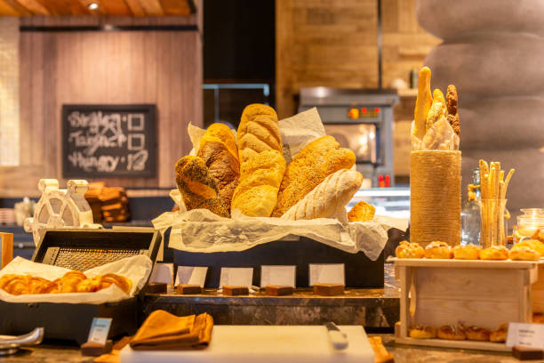 istock Modern bread counter with large fresh bakery products. 1217113063