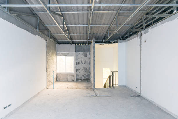 istock Construction site of empty Interior space, unfinished building after demolition process. Home improvement and renovation business. 1217113173