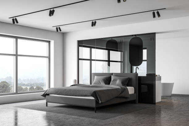 istock White master bedroom and bathroom corner 1217114484