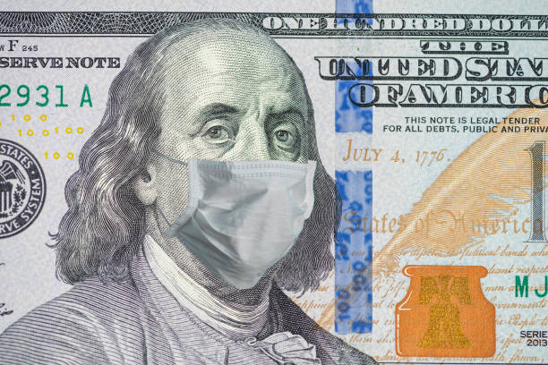 istock One Hundred Dollar Bill With Medical Face Mask on Benjamin Franklin 1217115650