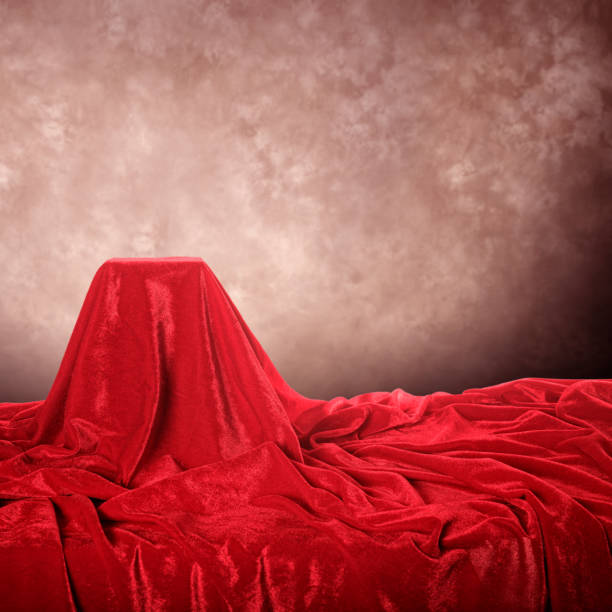 istock empty red velvet pedestal with copy space for product display 1217116281
