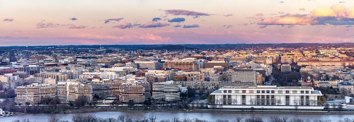 Panorama aerial view of Washington DC Skyscraper skylines building cityscape Capital of USA  from Arlington Virginia USA in sunset twilight.