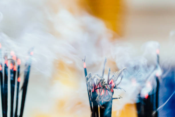 Burning incense at buddhist temple in Chiang Mai, Thailand