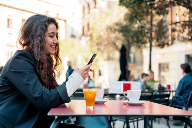 istock Young caucasian woman using smartphone 1217120764