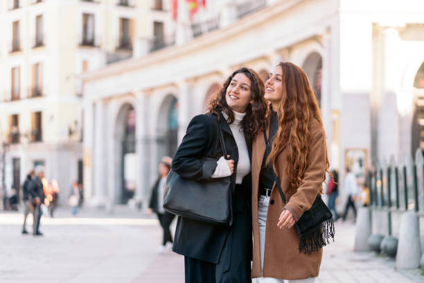 istock Two caucasian women walking together 1217120776