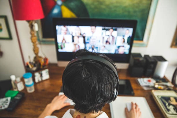 istock Woman working at home having a video conference with colleagues 1217123293