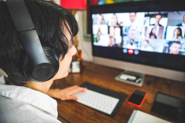 istock Woman working at home having a video conference with colleagues 1217123325