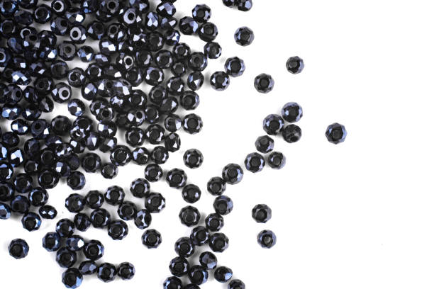 istock close up multi colored beads heap isolated on white 1217128131