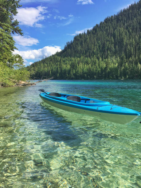 istock Kayak on clear lake water 1217128828