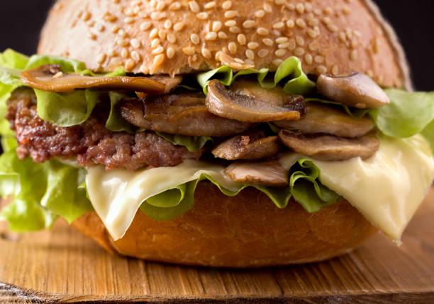 istock sandwich with mushrooms and cutlet close-up. 1217132028