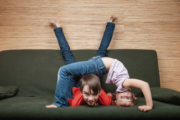 istock Siblings losing they mind confined at home during self-isolation 1217133179