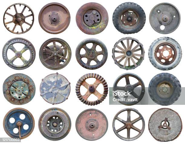 Twenty Rusty Metal Retro Wheels From An Agricultural Machinery.