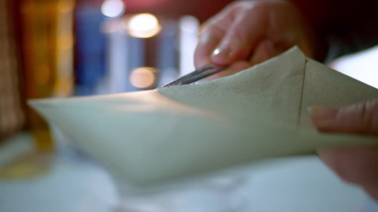 SLO MO Female hands opening an envelope