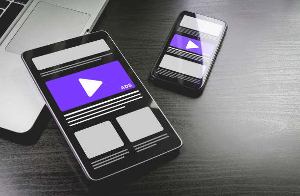 istock Programmatic Native Advertising - online targeting, ads marketing strategy. Advertising media banner block on sites and social networks on the screens of mobile gadgets. 1217135142