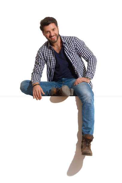 istock Relaxed Handsome Man Is Sitting On A Top 1217135286