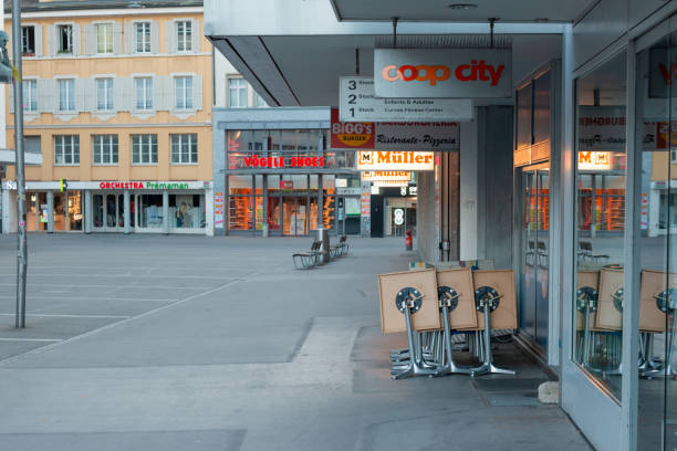 tidied up outside seating of a restaurant in a pedestrian zone stock photo