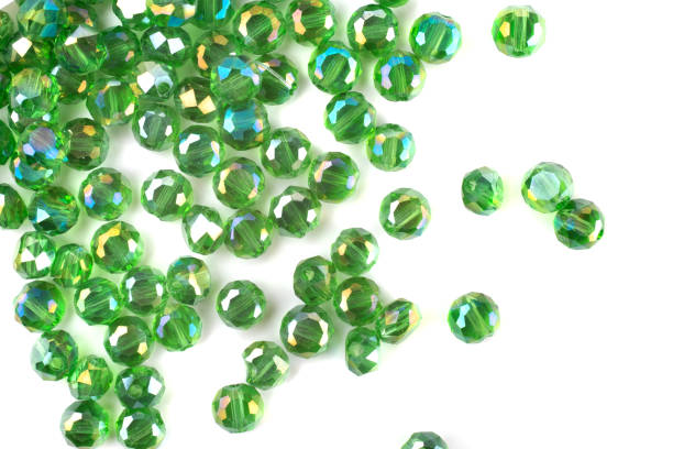 istock close up multi colored beads heap isolated on white 1217137487