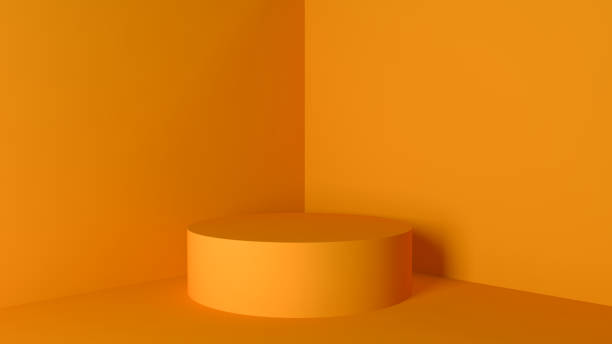 istock Orange cylindrical podium stands in empty corner, orange toned 3d rendering illustration 1217138391